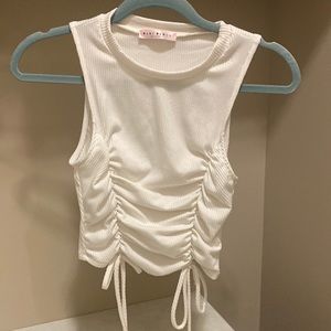 Never worn, white crop top with tie front adjustable shape